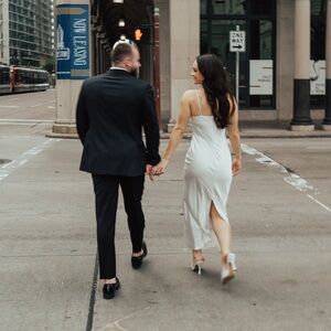 selfie Leslie white satin making headlines diamonte dress